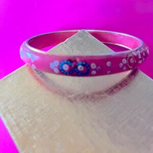 Wood Pink made in India bangle 2-1/2” inner width encrusted with brass look trim